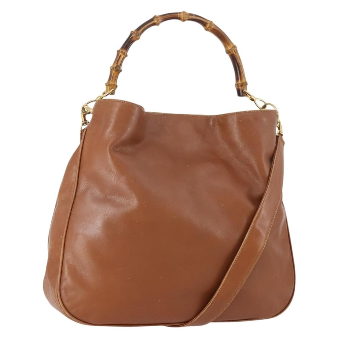 Gucci Bamboo leather brown gold 2way shoulder bag with strap: Gucci Bamboo leather brown gold 2way shoulder bag with strap This GUCCI Bamboo Shoulder Bag is crafted from brown and gold leather and features both a shoulder strap and handles for versatile 2-way ca
