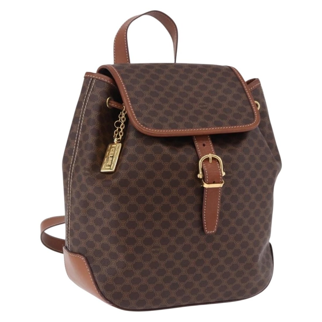 CELINE Macadam Canvas and PVC Leather Backpack Brown Gold: CELINE Macadam Canvas and PVC Leather Backpack Brown Gold CELINE Macadam Canvas backpack in brown and gold, made in Italy from PVC leather and Macadam canvas. This women's backpack features a structur