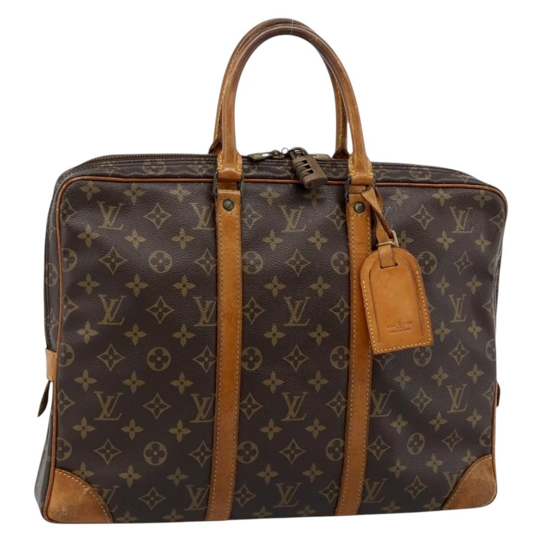Louis Vuitton M53361 Monogram Canvas Business Bag with Padlock Name Tag: Louis Vuitton M53361 Monogram Canvas Business Bag with Padlock Name Tag Louis Vuitton Monogram Porte Documents Voyage Business Bag in Monogram Canvas, made in France. This women's business bag comes w