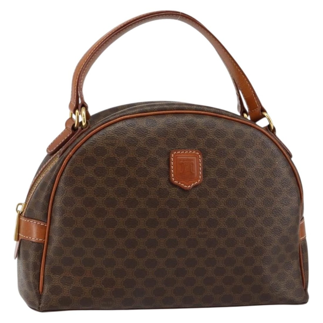 CELINE Brown PVC Leather Macadam Hand Bag Made in Italy: CELINE Brown PVC Leather Macadam Hand Bag Made in Italy Experience the elegance of this CELINE Macadam Canvas Hand Bag, crafted from durable PVC leather in a rich brown hue. This stylish hand bag show