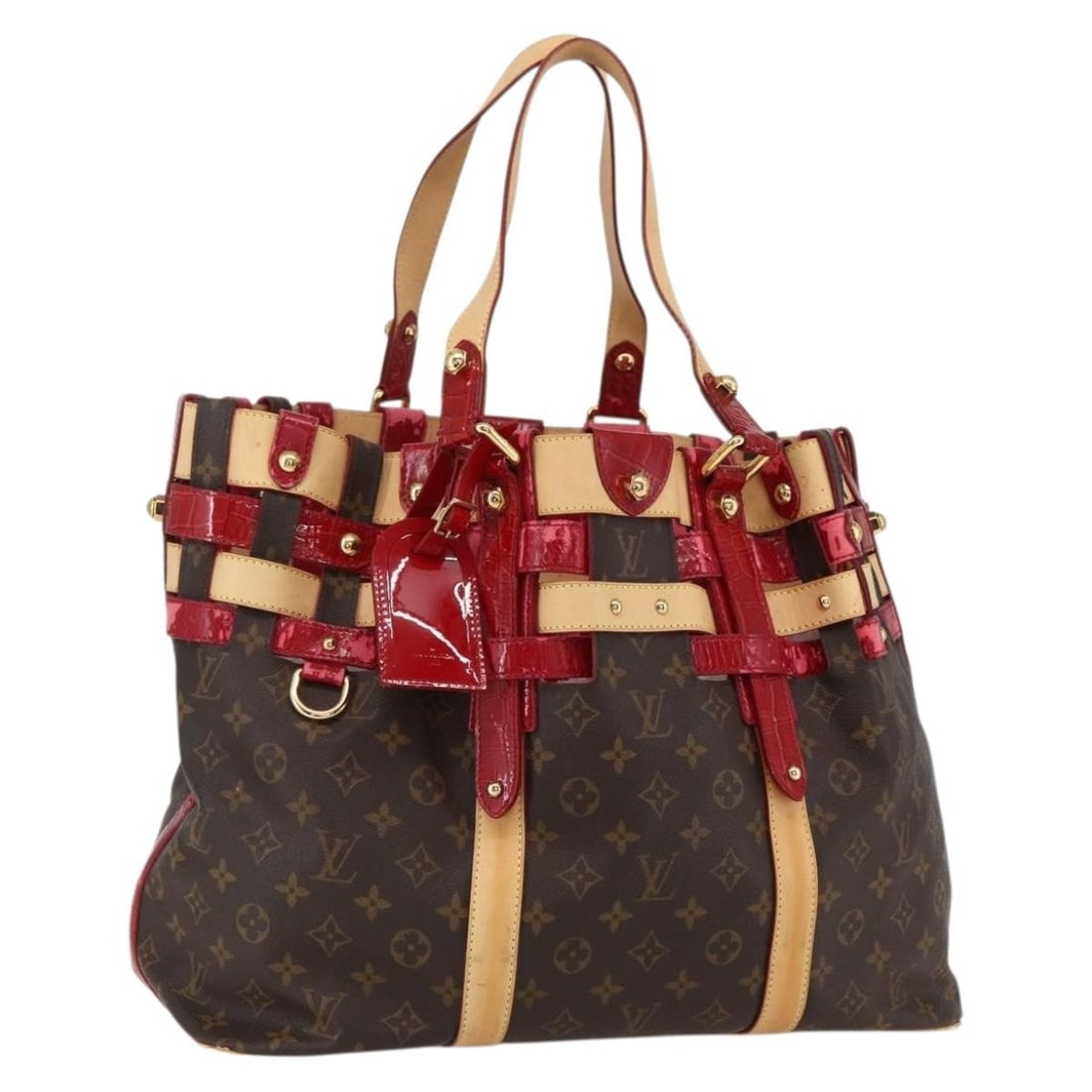 Monogram Canvas Ruby Sarina MM Tote in Red with Name Tag M95611: Monogram Canvas Ruby Sarina MM Tote in Red with Name Tag M95611 This is a Louis Vuitton Ruby Sarina MM tote bag crafted in monogram canvas with red accents. Made in Italy, the bag features a spacious 