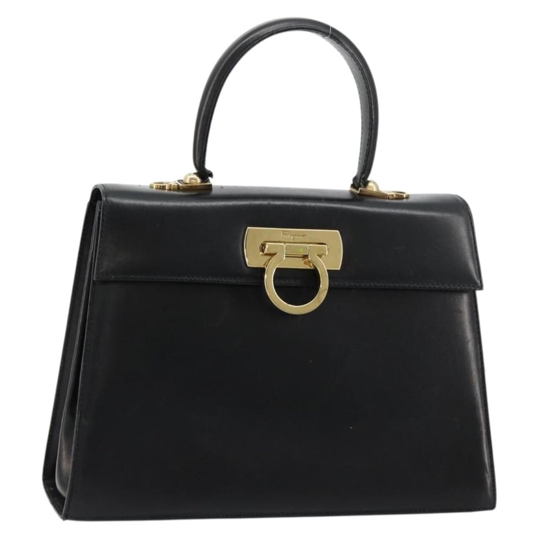 Salvatore Ferragamo Gancini Black Leather Handbag Gold Tone Italy: Salvatore Ferragamo Gancini Black Leather Handbag Gold Tone Italy Salvatore Ferragamo Gancini hand bag in black and gold leather, made in Italy. The bag measures approximately 27 cm W x 20 cm H x 10 c