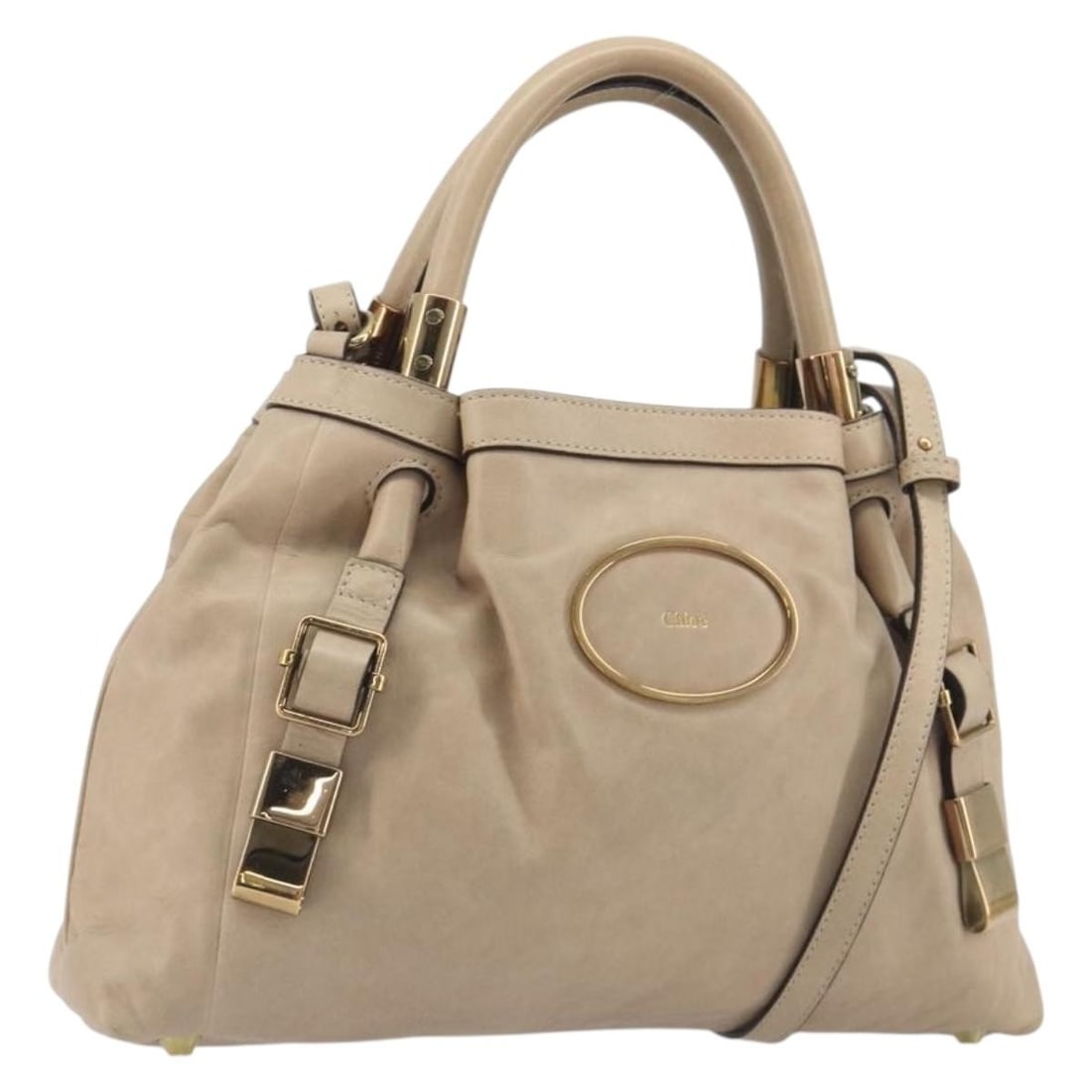 Chloe Victoria 2way Leather Handbag Beige Gold Tone Strap: Chloe Victoria 2way Leather Handbag Beige Gold Tone Strap Chloe Victoria 2-way handbag in beige/gold leather, made in Romania. It comes with a shoulder strap and features a structured handbag style wi