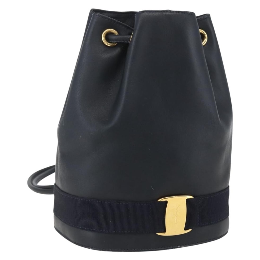 Navy Leather Salvatore Ferragamo Backpack with Gold Accents Italy: Navy Leather Salvatore Ferragamo Backpack with Gold Accents Italy This Salvatore Ferragamo backpack is crafted from navy leather with gold-tone accents. Made in Italy, it features a compact and practi