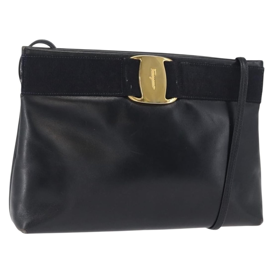 Navy Leather Vala Shoulder Bag by Salvatore Ferragamo Gold Accents: Navy Leather Vala Shoulder Bag by Salvatore Ferragamo Gold Accents This Salvatore Ferragamo Vala shoulder bag features navy leather with gold-tone accents. Designed for women, this Italian-made bag ha