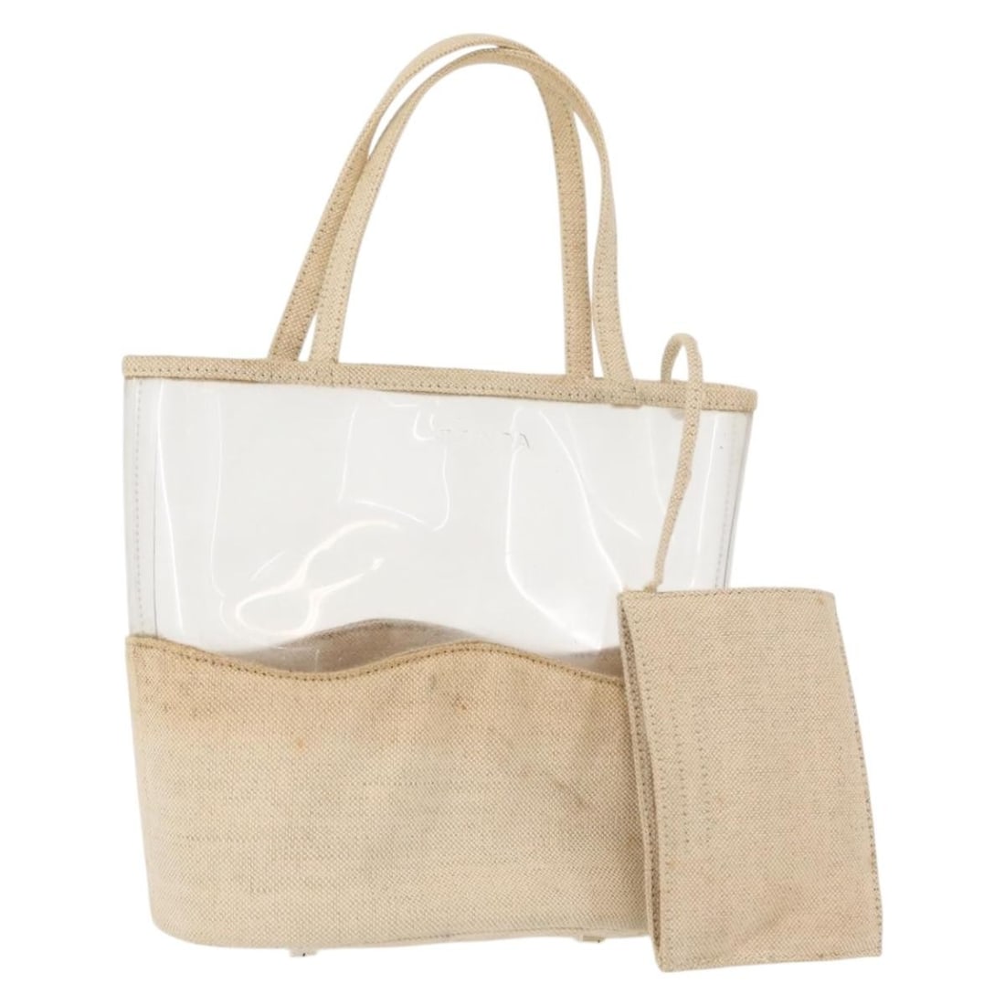 PRADA Vinyl Clear Beige Hand Bag with Pouch Made in Italy: PRADA Vinyl Clear Beige Hand Bag with Pouch Made in Italy This PRADA Hand Bag is a stylish and functional accessory crafted from clear vinyl, featuring a sophisticated beige color. Made in Italy, this