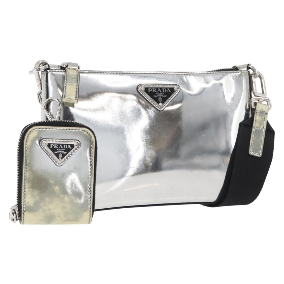 Prada Silver Patent Leather Shoulder Bag Italy Auth 177333A: Prada Silver Patent Leather Shoulder Bag Italy Auth 177333A This PRADA shoulder bag is crafted from silver patent leather and features a sleek, compact silhouette. Designed for women, it is made in It