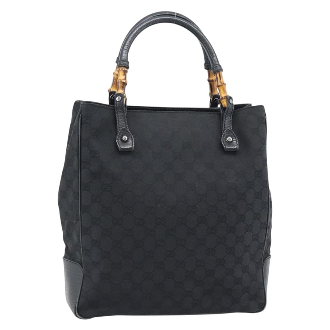 Gucci 112530 GG Canvas Bamboo Handbag Black Silver: Gucci 112530 GG Canvas Bamboo Handbag Black Silver This Gucci hand bag is crafted from GG Canvas in black and silver, with bamboo detailing and silver-tone metal fittings. It measures approximately 28