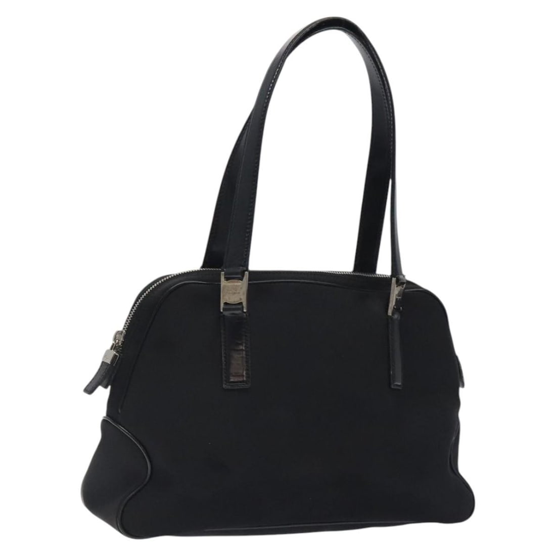 Black Nylon Vala Shoulder Purse by Salvatore Ferragamo Italy: Black Nylon Vala Shoulder Purse by Salvatore Ferragamo Italy This Salvatore Ferragamo Vala shoulder bag features a black nylon exterior with silver-tone accents. Designed for women, it offers a spacio