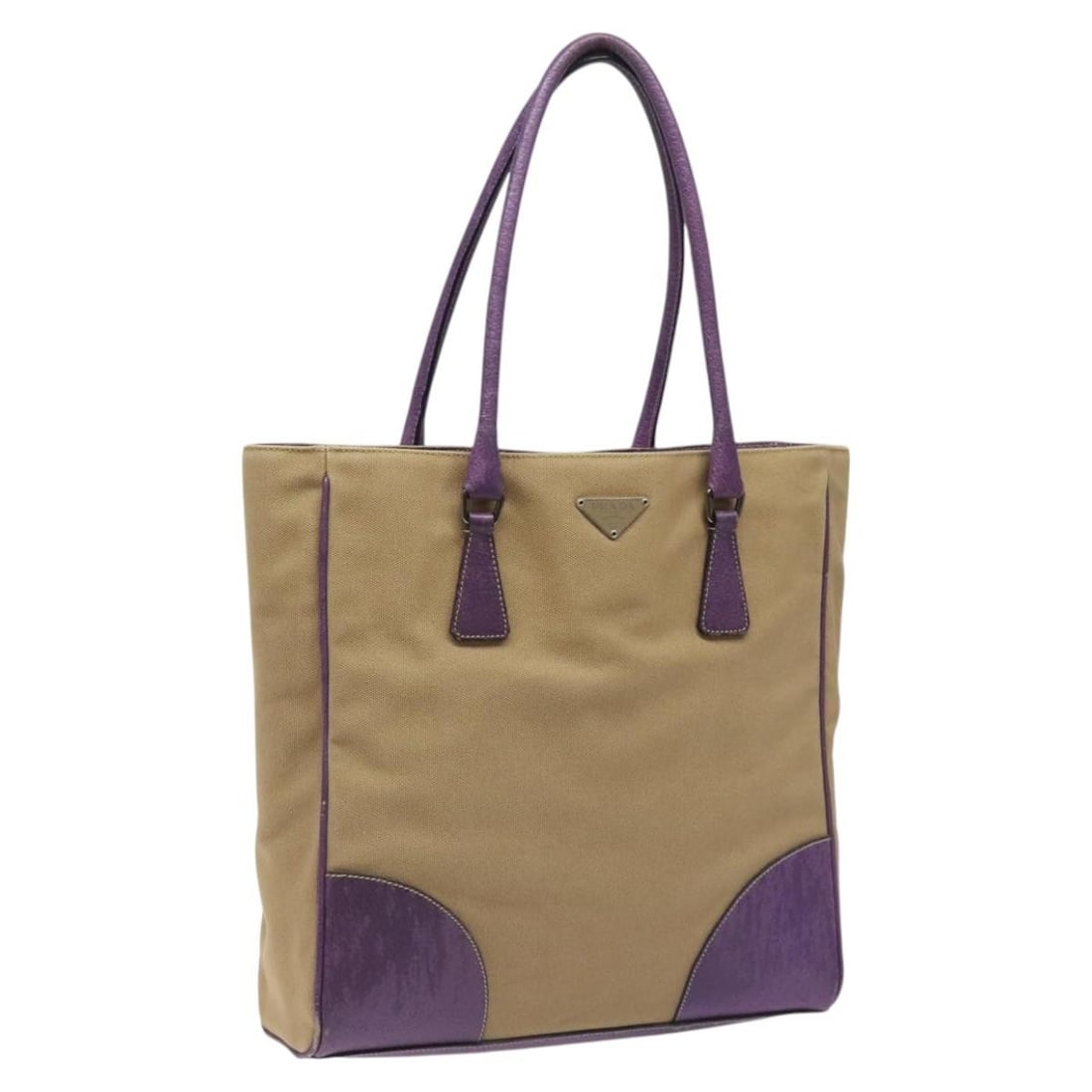 Prada beige canvas women tote with guarantee card: Prada beige canvas women tote with guarantee card This PRADA tote bag is crafted from beige canvas and features a spacious design suitable for daily use. Made in Italy, the bag includes a guarantee ca