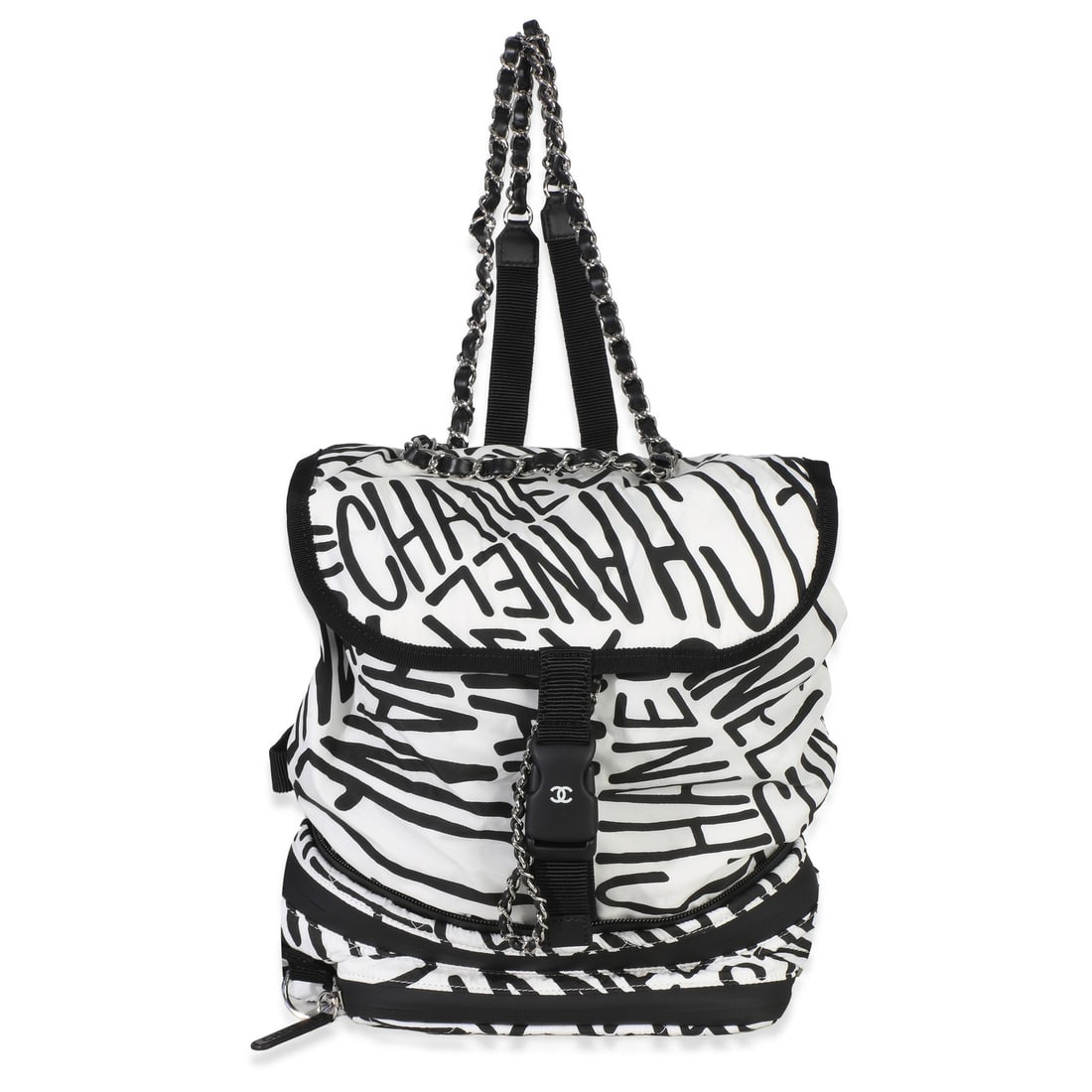 Chanel Coco Neige Nylon Backpack Black White Print Dustbag: Chanel Coco Neige Nylon Backpack Black White Print Dustbag This Chanel Coco Neige Backpack features a stylish black and white printed nylon exterior with silver-tone hardware. Designed for versatility