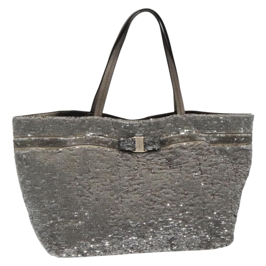 Silver Nylon Salvatore Ferragamo Vala Tote Bag Auth 138278: Silver Nylon Salvatore Ferragamo Vala Tote Bag Auth 138278 This Salvatore Ferragamo Vala tote bag features a silver sequin design crafted from durable nylon. The bag offers ample space for daily essen