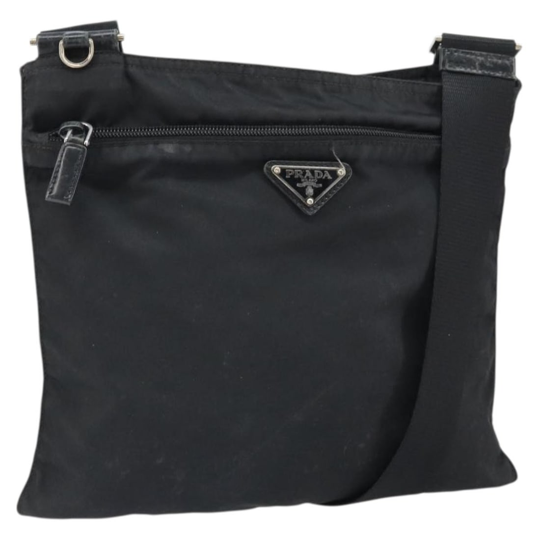 Prada Black Nylon Shoulder Bag Silver Tone Hardware Italy: Prada Black Nylon Shoulder Bag Silver Tone Hardware Italy Black Prada nylon shoulder bag with silver-tone hardware, made in Italy. The bag measures approximately 29 cm W x 25 cm H x 1 cm D, with a sho