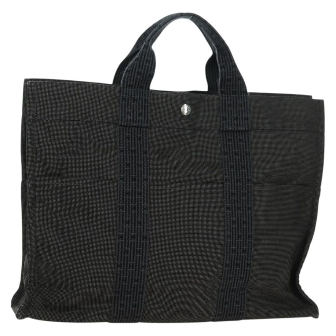 Hermes Her Line MM gray canvas tote handbag: Hermes Her Line MM gray canvas tote handbag This Hermes Her Line MM Hand Bag is crafted from gray canvas, offering a stylish and durable accessory for everyday use. Designed for women, it features a s