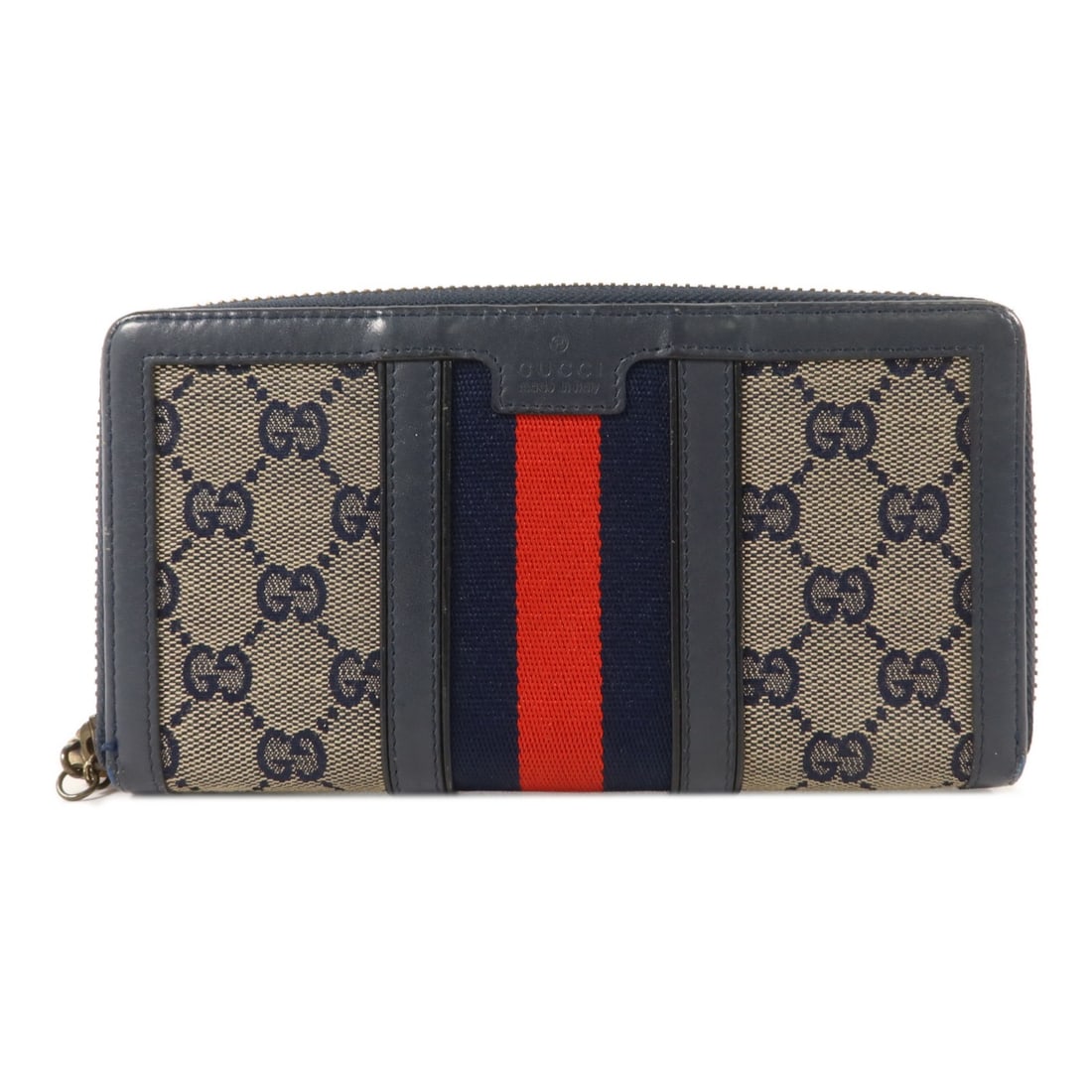 Gucci 353651 GG Canvas Zip Around Wallet Navy Calfskin: Gucci 353651 GG Canvas Zip Around Wallet Navy Calfskin Long round wallet in navy blue GG canvas and calfskin (cowhide) leather. It features a fastener wallet compartment, three wallet sections, one co
