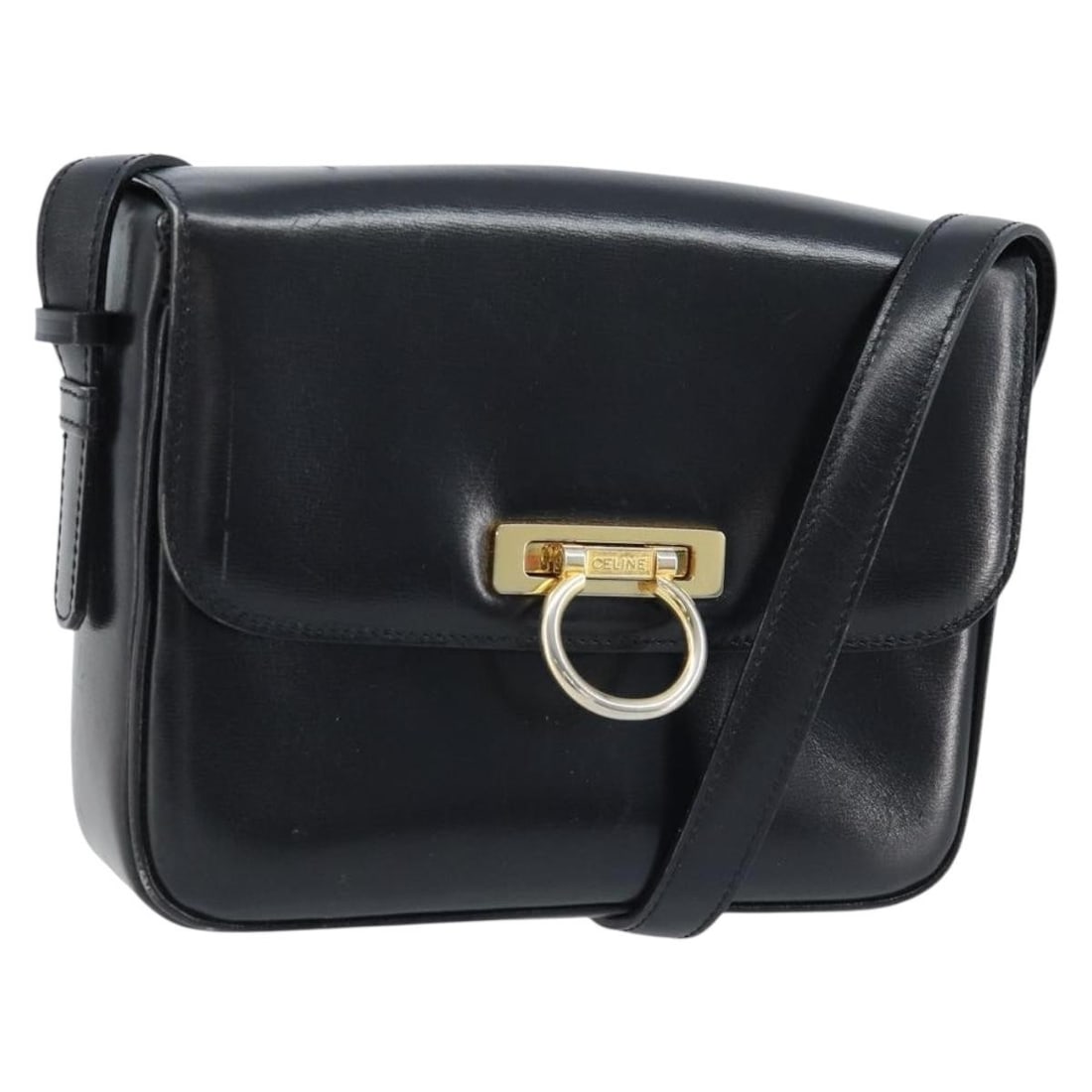 Celine Leather Shoulder Bag Black and Gold with Pouch: Celine Leather Shoulder Bag Black and Gold with Pouch This CELINE shoulder bag features a classic black leather exterior with gold-tone accents. Designed for women, it offers a compact yet functional 