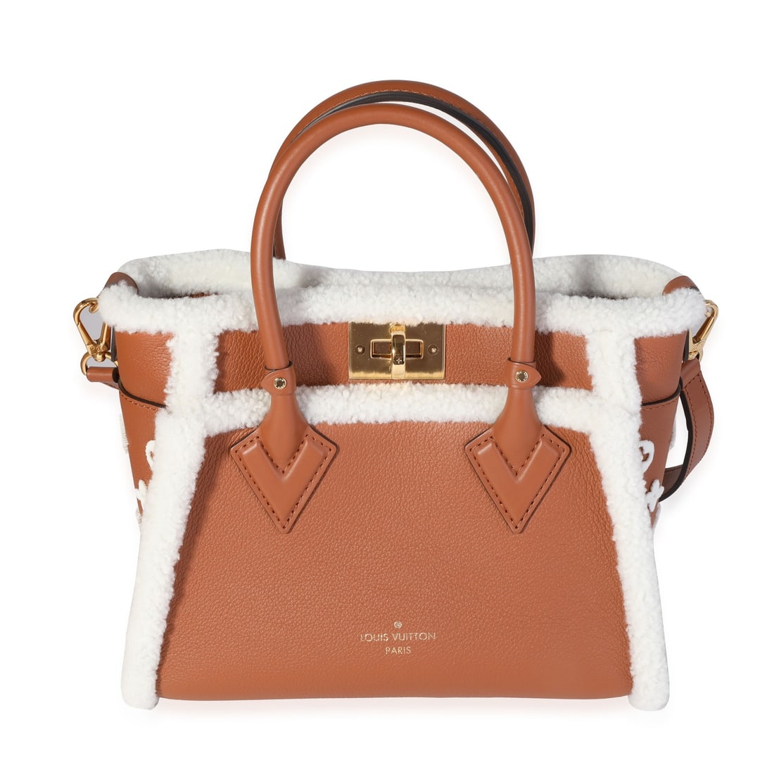 Louis Vuitton On My Side PM shearling calfskin handbag caramel brown: Louis Vuitton On My Side PM shearling calfskin handbag caramel brown A Louis Vuitton On My Side PM handbag in brown leather with a shearling finish and caramel interior color. It features a turnlock c
