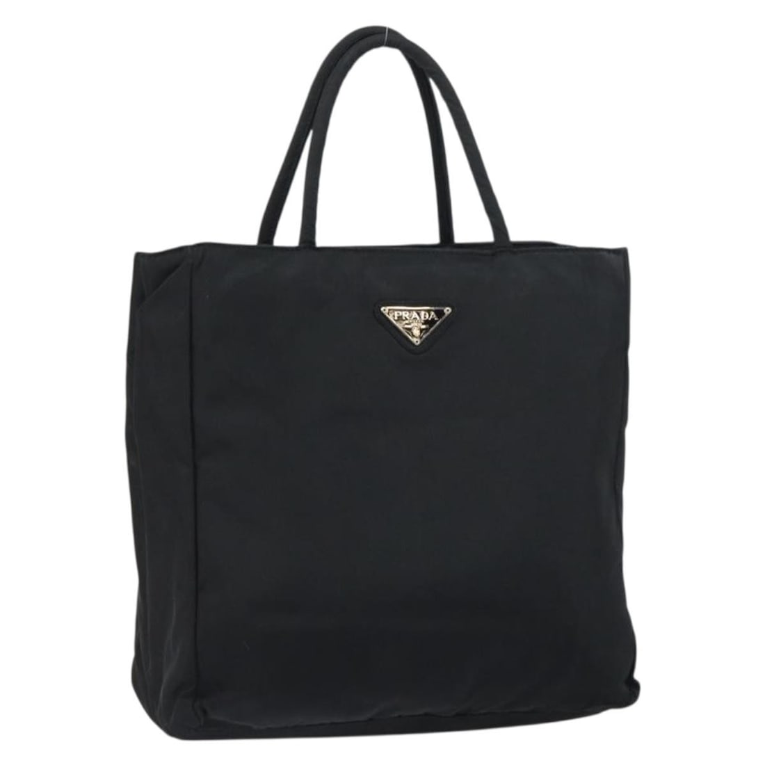 Black Nylon Prada Handbag Made in Italy: Black Nylon Prada Handbag Made in Italy This authentic Prada handbag is crafted from black nylon, offering a sleek and practical accessory. Made in Italy, it features a compact design with a handle dr