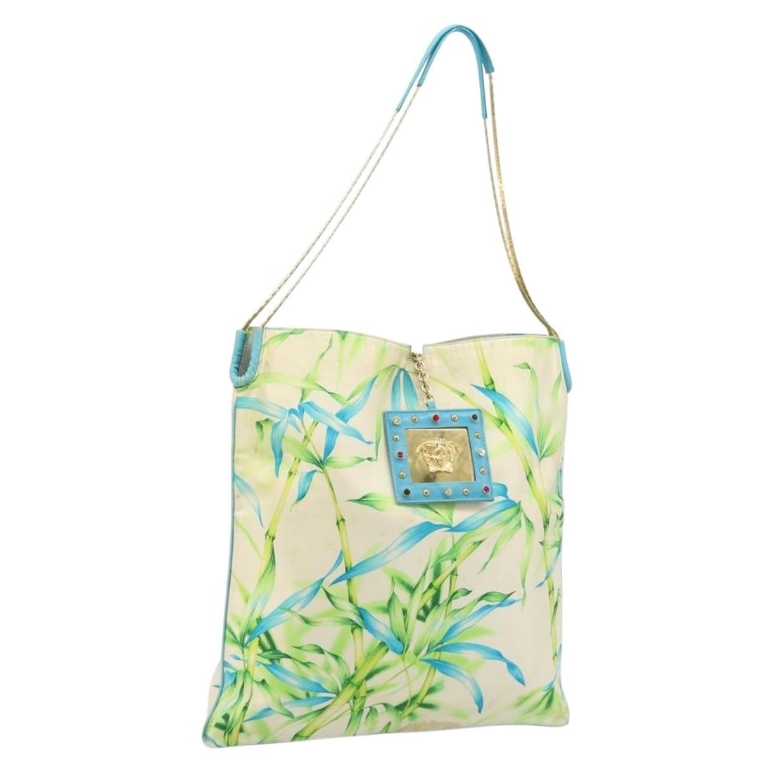 VERSACE Multicolor Gold Canvas Tote Bag with Mirror Made in Italy: VERSACE Multicolor Gold Canvas Tote Bag with Mirror Made in Italy Versace tote bag in multicolor and gold canvas, made in Italy. It comes with a mirror accessory and is sized at approximately 39 cm wi