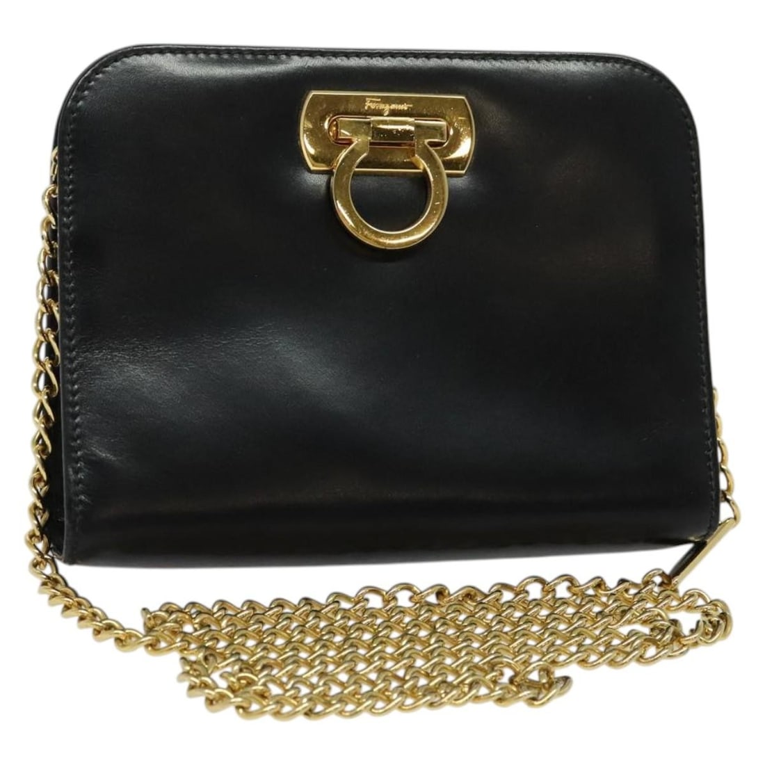 Salvatore Ferragamo Gancini black gold leather shoulder bag: Salvatore Ferragamo Gancini black gold leather shoulder bag This Salvatore Ferragamo Gancini chain shoulder bag is crafted from black leather with gold-tone accents. Designed for women, the bag featur