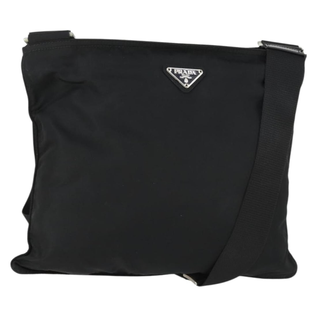 Black Nylon Shoulder Bag by Prada with Silver Accents: Black Nylon Shoulder Bag by Prada with Silver Accents This Prada shoulder bag features a black nylon exterior with silver-tone accents. The bag is made in Italy and showcases a practical shoulder stra