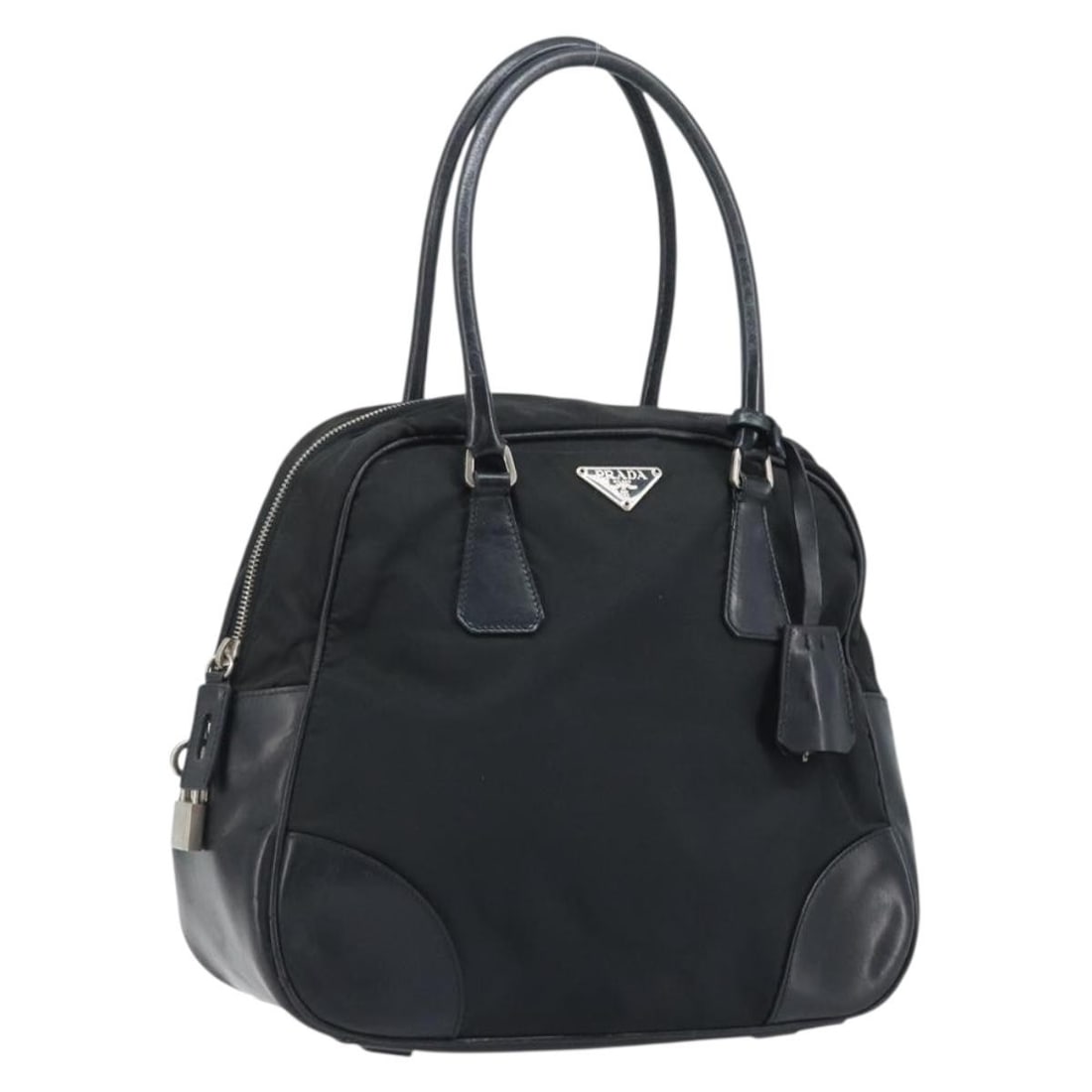 Prada Black Nylon Handbag with Silver Tone Hardware and Padlock: Prada Black Nylon Handbag with Silver Tone Hardware and Padlock This PRADA handbag is crafted from black nylon with silver-tone accents, designed for women. Made in Italy, it features a spacious main 