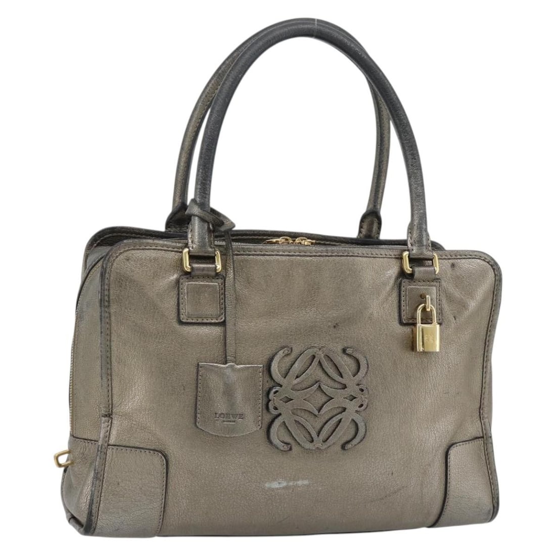 LOEWE Amazona 36 suede handbag bronze gold with padlock keys: LOEWE Amazona 36 suede handbag bronze gold with padlock keys LOEWE Amazona 36 handbag in suede with a bronze/gold exterior. Made in Spain, this women's handbag includes a padlock, two keys, and a cloc