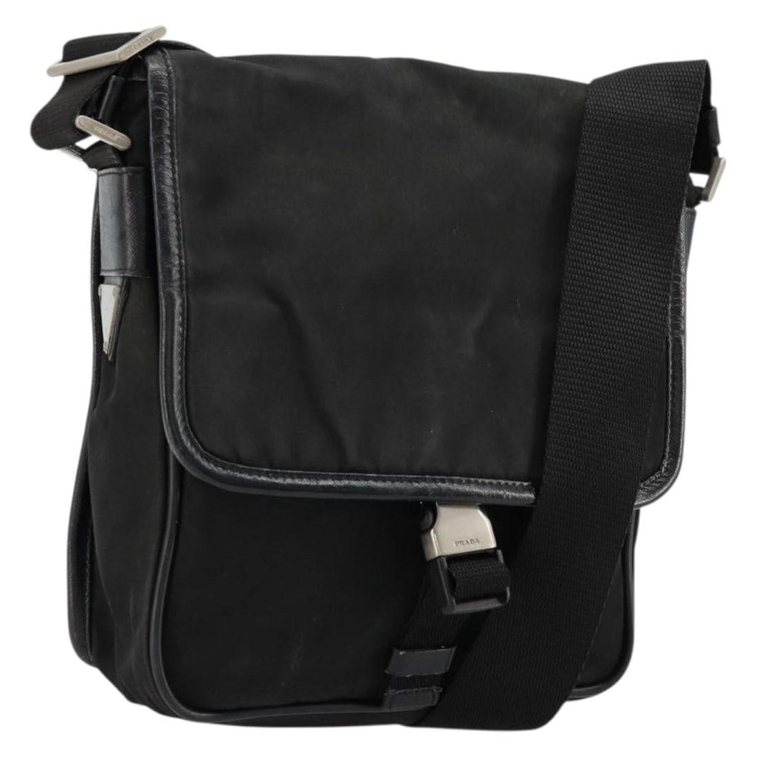 Prada Black Nylon Shoulder Bag Silver Trim Italy: Prada Black Nylon Shoulder Bag Silver Trim Italy This PRADA shoulder bag is crafted from black nylon with silver-tone accents. Designed for women, it features an adjustable shoulder strap and is made 