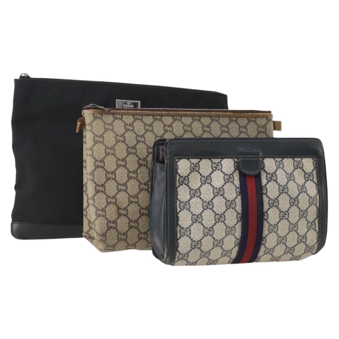 Set of 3 Gucci Sherry Line GG Supreme Plus PVC Clutch Bags: Set of 3 Gucci Sherry Line GG Supreme Plus PVC Clutch Bags A Gucci GG Supreme Plus Sherry Line clutch bag in black and beige, made from PVC leather and GG canvas. This special set offer is listed as a