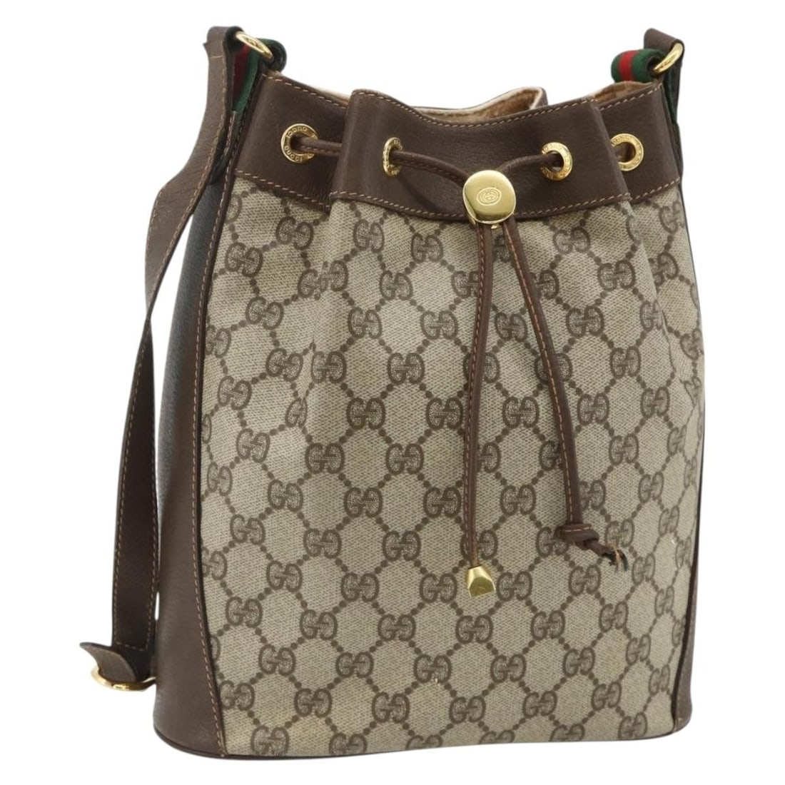 Gucci GG Canvas Beige Gold Shoulder Bag Drawstring Web Strap Italy: Gucci GG Canvas Beige Gold Shoulder Bag Drawstring Web Strap Italy This GUCCI GG Supreme Drawstring Bag from the Web Sherry Line features a beige and gold GG canvas exterior with a drawstring closure.