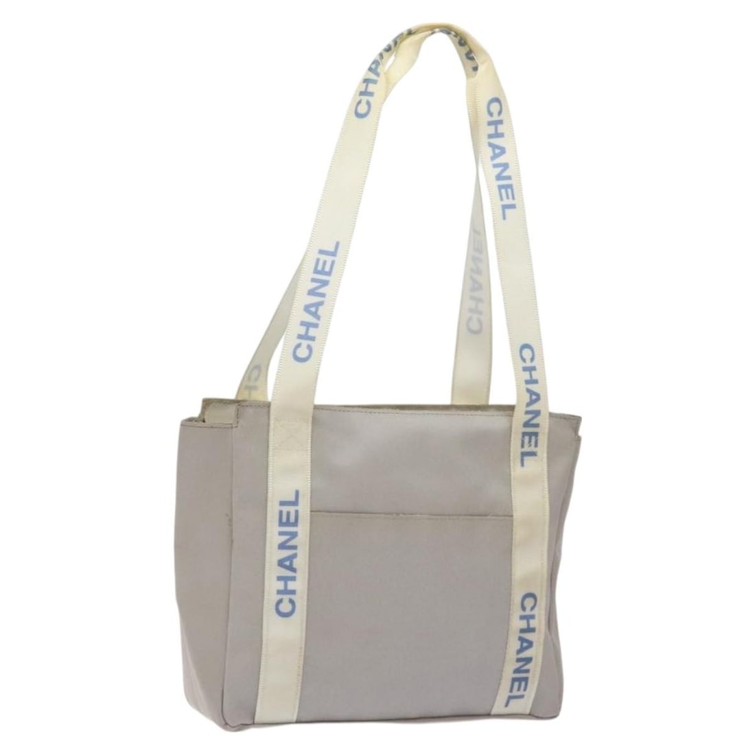 CHANEL Greige Silver PVC Tote Bag Auth 5752732 Made in France: CHANEL Greige Silver PVC Tote Bag Auth 5752732 Made in France This authentic CHANEL Tote Bag is crafted from durable PVC leather in a sophisticated greige and silver color combination. Designed for bo