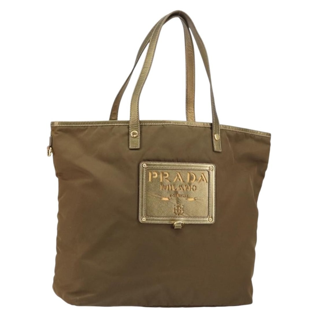 PRADA Nylon Brown Gold Tote Bag Italy Women: PRADA Nylon Brown Gold Tote Bag Italy Women This PRADA tote bag is crafted from brown nylon with gold accents and was made in Italy. Designed for women, it features a spacious interior and comfortable