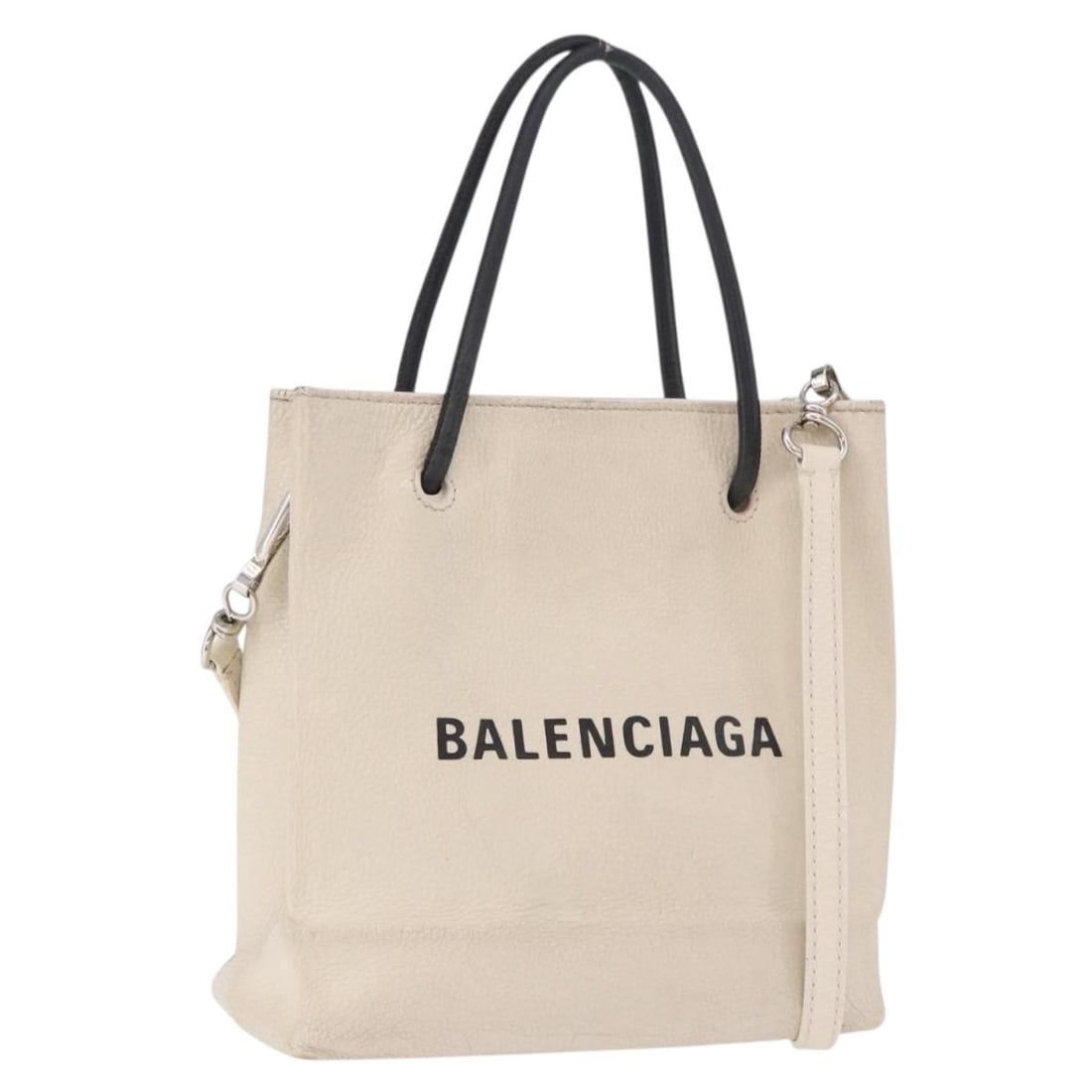 Balenciaga XXS Shopping Tote 2way Leather Bag White 528655: Balenciaga XXS Shopping Tote 2way Leather Bag White 528655 A Balenciaga Shopping Tote Bag XXS in leather with a 2-way design and shoulder strap. The bag is presented in silver/white and was made in It