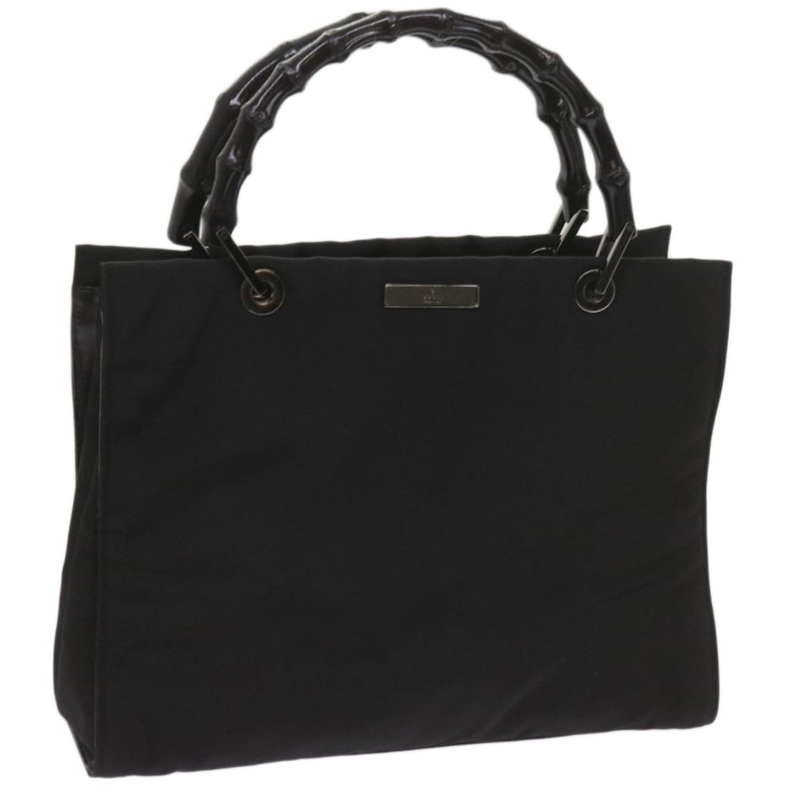 Gucci Bamboo black canvas handbag 002 1016: Gucci Bamboo black canvas handbag 002 1016 This GUCCI Bamboo Hand Bag features a black canvas exterior and a classic bamboo handle design. Made in Italy, the handbag showcases a structured silhouette 
