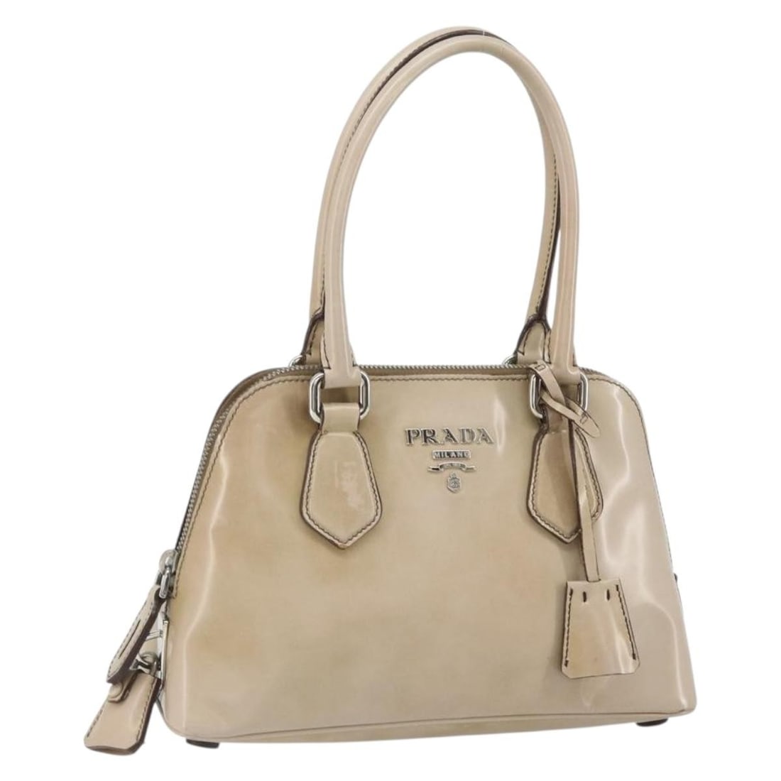 PRADA Beige Silver Patent Leather Hand Bag with Padlock Keys: PRADA Beige Silver Patent Leather Hand Bag with Padlock Keys Prada women's patent leather handbag in beige and silver, made in Italy. This heavily used bag includes a padlock, two keys, and a clochett