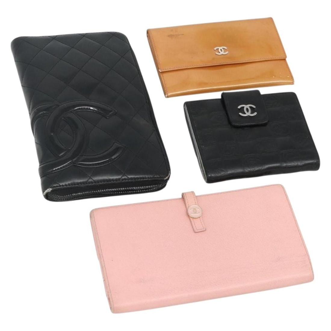 Set of 4 CHANEL Leather Wallets Orange Pink Black CC: Set of 4 CHANEL Leather Wallets Orange Pink Black CC CHANEL leather wallet set in orange, pink, and black. The item is offered as shown in the photo only, with no box or dust bag included. It is in he