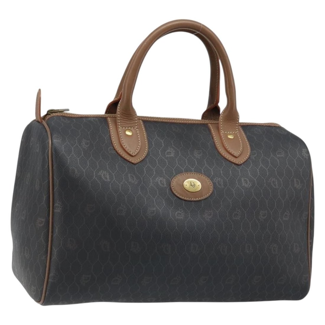 Christian Dior Black Honeycomb PVC Handbag with Gold Accents: Christian Dior Black Honeycomb PVC Handbag with Gold Accents This Christian Dior women's hand bag features a signature honeycomb canvas design with black and gold PVC leather accents. The bag is craft