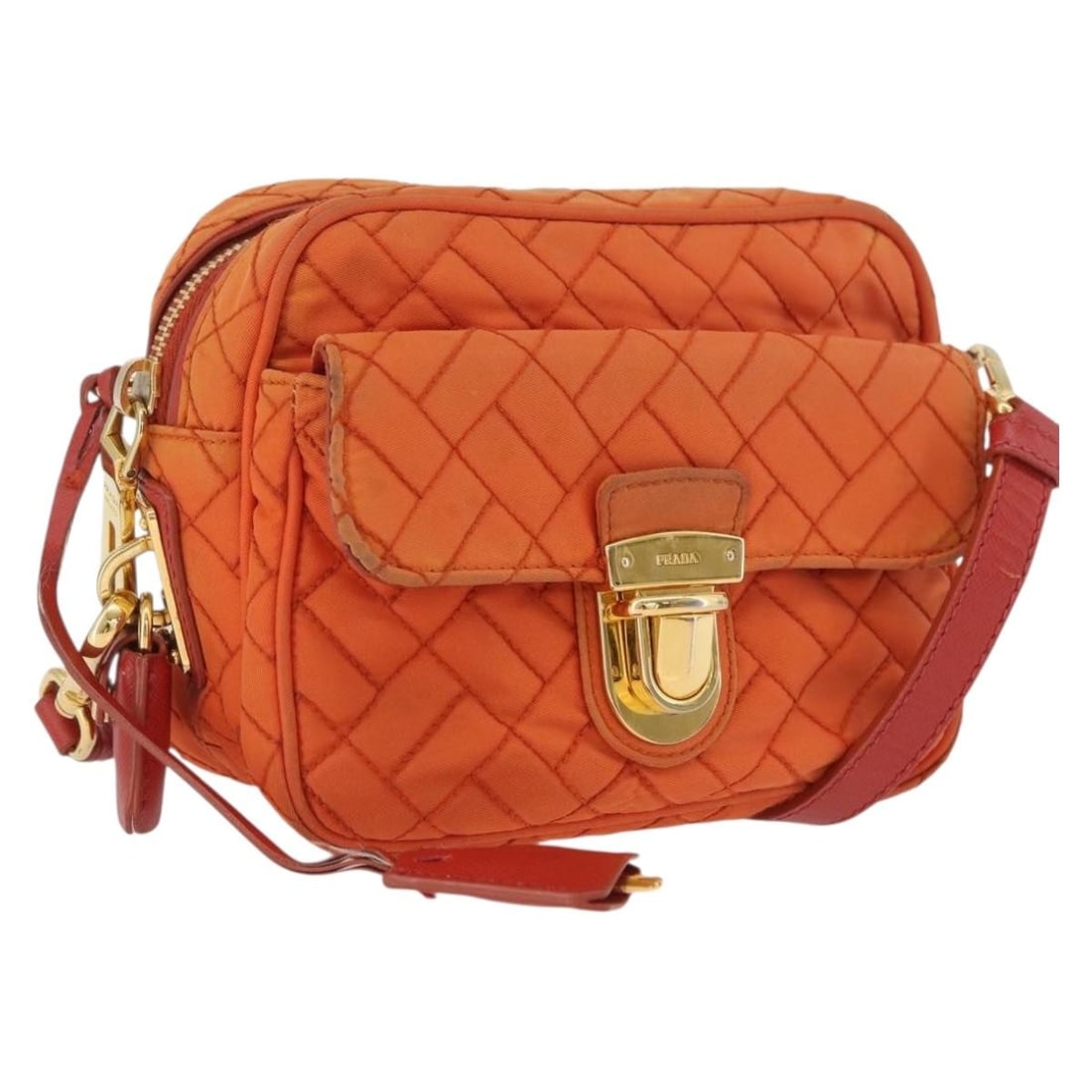 PRADA Nylon Shoulder Bag Orange Gold Padlock Key Clochette: PRADA Nylon Shoulder Bag Orange Gold Padlock Key Clochette Prada shoulder bag in orange and gold nylon with an adjustable shoulder strap. Includes a padlock, two keys, and clochette. Condition is heav