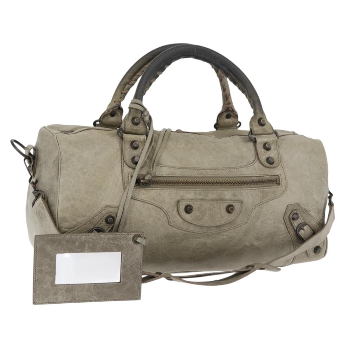 Balenciaga Twiggy 128523 Ivory Leather 2way Handbag with Strap Mirror: Balenciaga Twiggy 128523 Ivory Leather 2way Handbag with Strap Mirror Balenciaga The Twiggy Hand Bag is a 2-way leather handbag in ivory, made in Italy. It comes with a shoulder strap and mirror. The 
