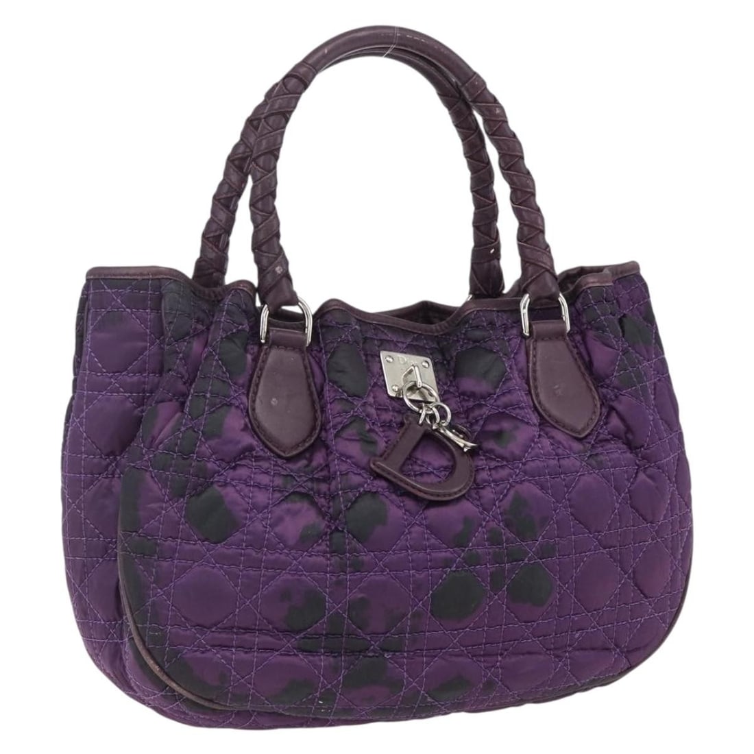 Christian Dior purple nylon Cannage handbag with charm: Christian Dior purple nylon Cannage handbag with charm This Christian Dior Canage handbag is crafted from purple and silver nylon, featuring silver-tone hardware and a decorative charm. Designed for w