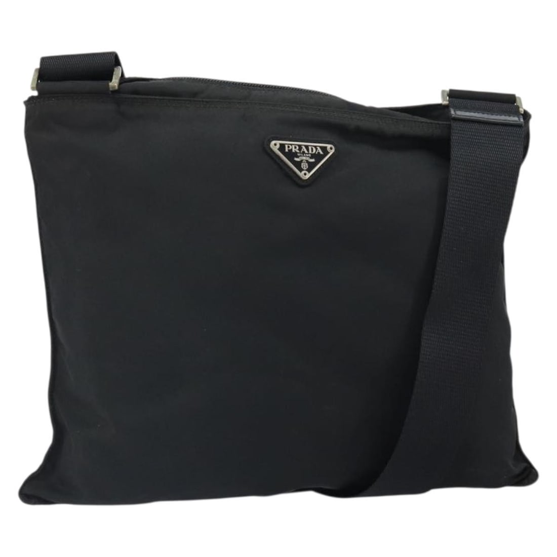 Prada Black Nylon Shoulder Bag Silver Tone Italy 162132: Prada Black Nylon Shoulder Bag Silver Tone Italy 162132 A Prada shoulder bag in black nylon with silver-tone hardware. Made in Italy, this bag measures approximately 32 cm W x 28 cm H x 1 cm D, with a