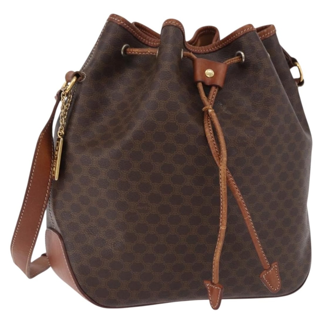 CELINE Macadam Canvas PVC Leather Shoulder Bag Brown Gold Charm: CELINE Macadam Canvas PVC Leather Shoulder Bag Brown Gold Charm CELINE Macadam Canvas shoulder bag in brown and gold, made in Italy from PVC leather and Macadam canvas. It comes with a charm and has a