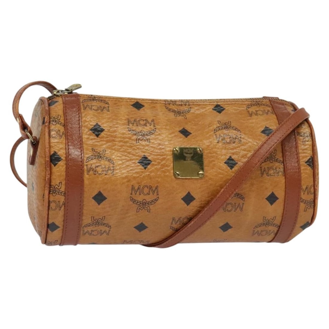 MCM Vicetos Brown Shoulder Bag in PVC Leather for Women: MCM Vicetos Brown Shoulder Bag in PVC Leather for Women This MCM Vicetos Logogram shoulder bag features a brown PVC leather exterior and is designed for women. The bag shows significant signs of use, 