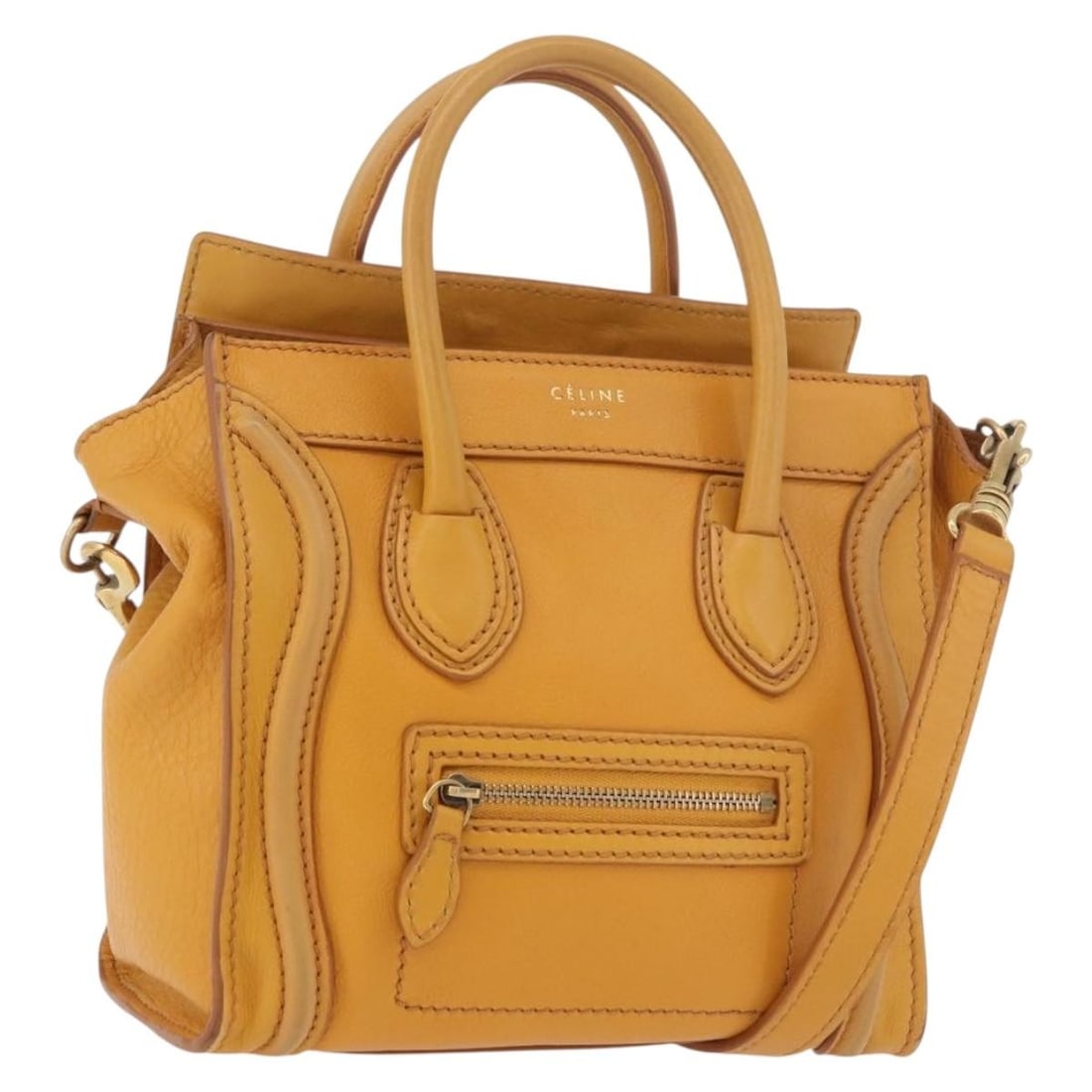 Celine Nano Luggage Leather 2way Handbag Yellow Gold with Strap: Celine Nano Luggage Leather 2way Handbag Yellow Gold with Strap Celine Luggage Nano Shopper handbag in leather, presented in yellow/gold. It comes with a shoulder strap and was made in Italy. The bag 