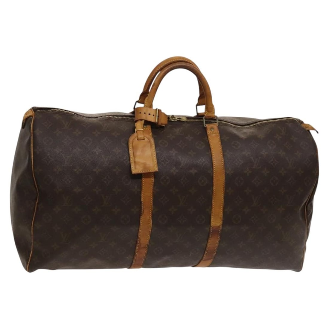 Louis Vuitton M41422 Keepall 60 Monogram Canvas Boston Bag: Louis Vuitton M41422 Keepall 60 Monogram Canvas Boston Bag Louis Vuitton Keepall 60 Boston bag in Monogram canvas, made in France. This heavily used travel bag includes a name tag and Powanie. Conditi