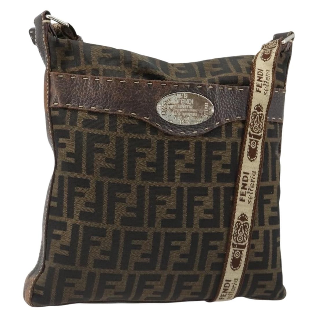 Fendi Zucca Canvas Shoulder Bag Black Brown Made in Italy: Fendi Zucca Canvas Shoulder Bag Black Brown Made in Italy Fendi Zucca Canvas Shoulder Bag in black and brown, made in Italy. This shoulder bag is crafted from Zucca canvas and measures approximately W