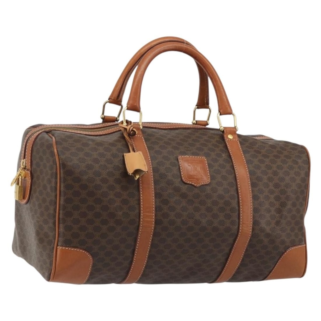 Celine Macadam Boston Bag Brown PVC Leather with Padlock Keys: Celine Macadam Boston Bag Brown PVC Leather with Padlock Keys A CELINE Boston bag in brown and gold, crafted from PVC leather and Macadam canvas. It includes a padlock, two keys, and a clochette. Made