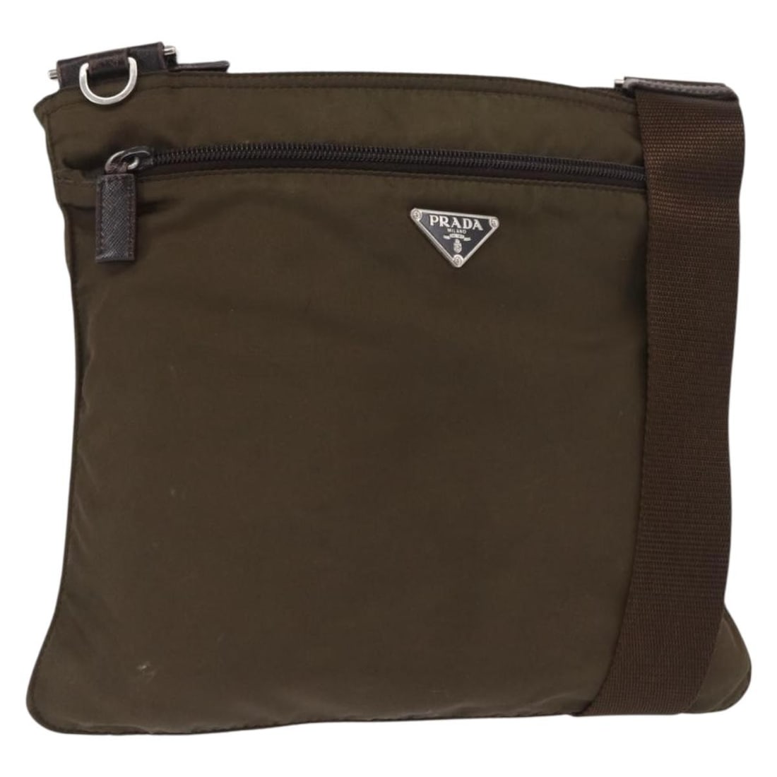 Prada khaki nylon shoulder bag silver trim Italy: Prada khaki nylon shoulder bag silver trim Italy This PRADA shoulder bag is crafted from durable nylon in a khaki and silver color combination. Designed for women, it features an adjustable shoulder s
