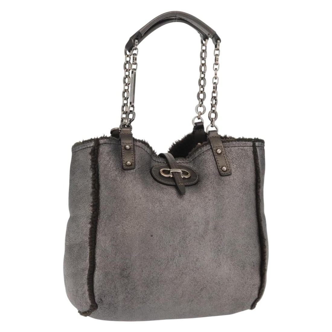 Gray Canvas Salvatore Ferragamo Gancini Handbag Italy: Gray Canvas Salvatore Ferragamo Gancini Handbag Italy This Salvatore Ferragamo Gancini handbag features a gray canvas exterior and is crafted in Italy. The bag shows signs of heavy use, including loss