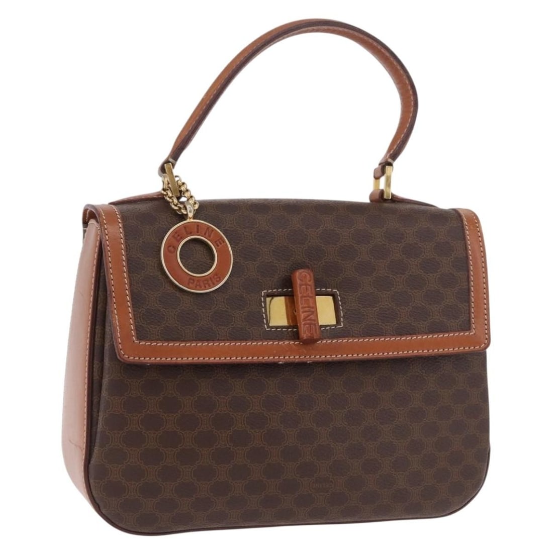 CELINE Macadam Brown PVC Leather Handbag Gold Tone Italy: CELINE Macadam Brown PVC Leather Handbag Gold Tone Italy A CELINE hand bag in brown and gold, made from PVC leather and Macadam canvas. It was made in Italy and comes with the item shown in the photo 